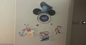 A door decorated with cut outs of Disney characters