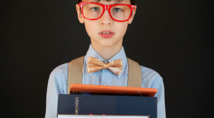 Boy with Stack of Books