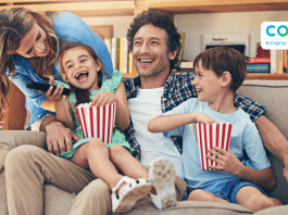 family watching movie from couch