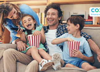 family watching movie from couch