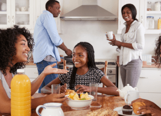 teenagers over breakfast with parents