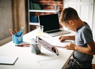 child doing homework online