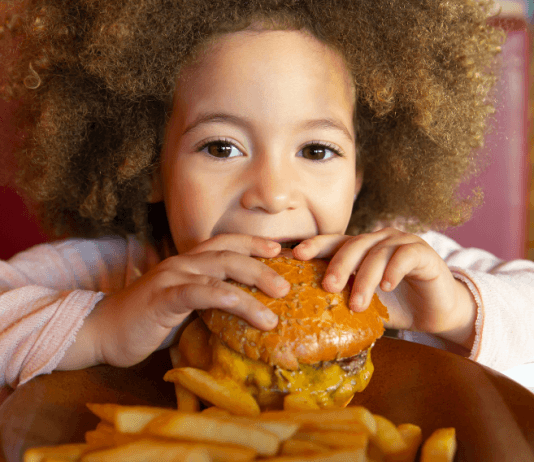 San Diego Moms’ Ultimate Guide: Top 13 Burger Joints littlegirl eating cheeseburger
