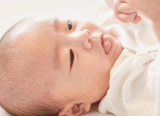 baby with tongue out