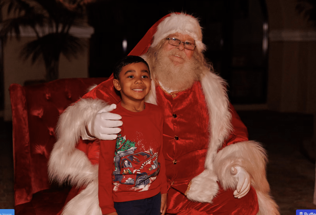 Screenshot 2025-10-13 at 10.51.24 AM photo with santa